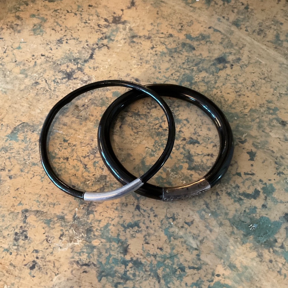 Pair of vintage ebonized bracelets, likely sterling accents